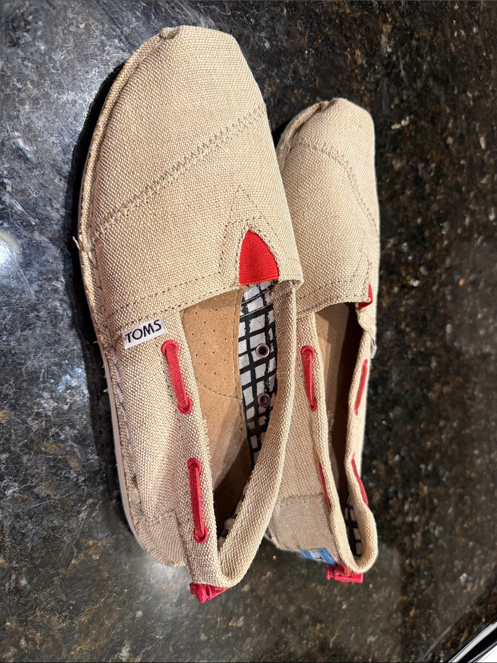 TOMS Classic Canvas Slip-Ons in Beige with Red Accents
